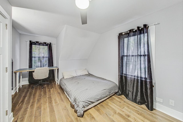 1049 Fowler Ave, Evanston, IL 60202 - bedroom featuring wood finished floors, baseboards, and vaulted ceiling