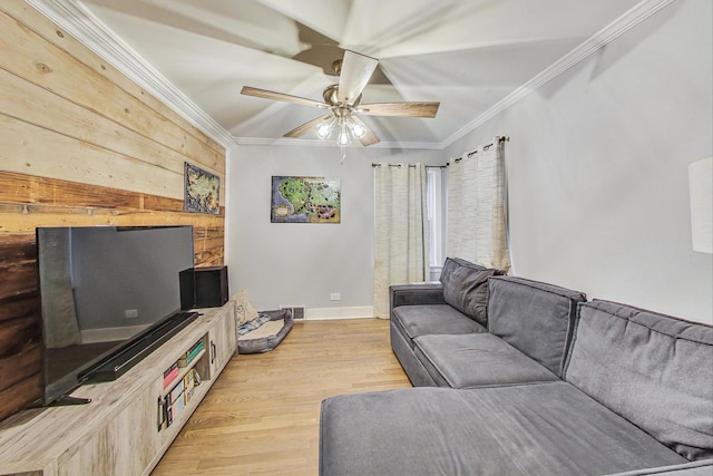 1049 Fowler Ave, Evanston, IL 60202 - living area with crown molding, light wood finished floors, ceiling fan, vaulted ceiling, and baseboards