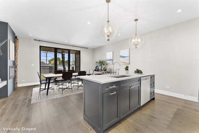3406 N Keating Ave, Chicago, IL 60641 - kitchen featuring dishwasher, a chandelier, light wood-style flooring, gray cabinetry, and recessed lighting
