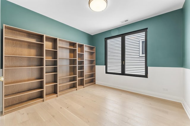 3406 N Keating Ave, Chicago, IL 60641 - unfurnished room featuring baseboards and wood finished floors