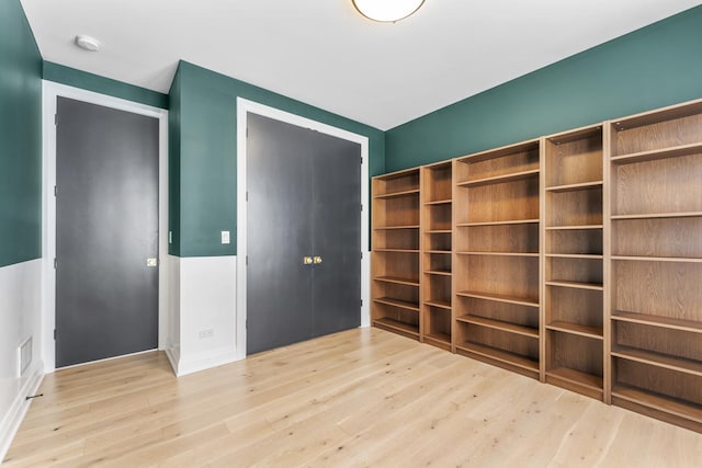 3406 N Keating Ave, Chicago, IL 60641 - unfurnished bedroom featuring wood finished floors and a closet