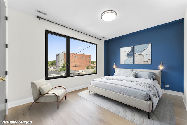 3406 N Keating Ave, Chicago, IL 60641 - bedroom featuring wood finished floors