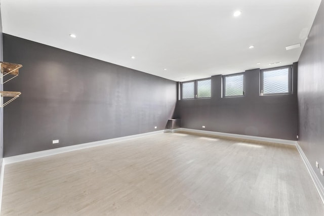 3406 N Keating Ave, Chicago, IL 60641 - spare room featuring wood finished floors and recessed lighting