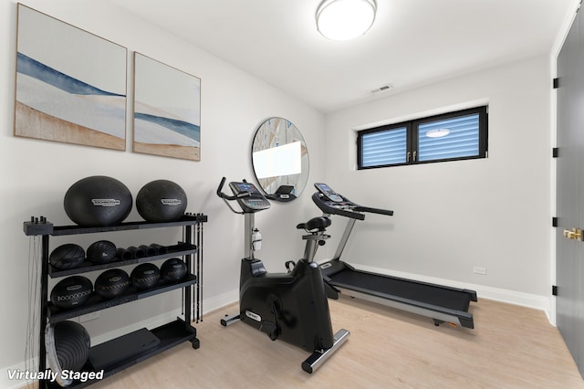 3406 N Keating Ave, Chicago, IL 60641 - workout room with wood finished floors
