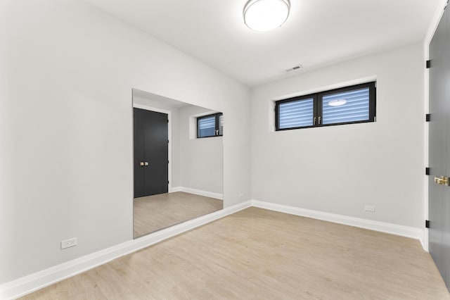 3406 N Keating Ave, Chicago, IL 60641 - unfurnished room featuring wood finished floors and baseboards