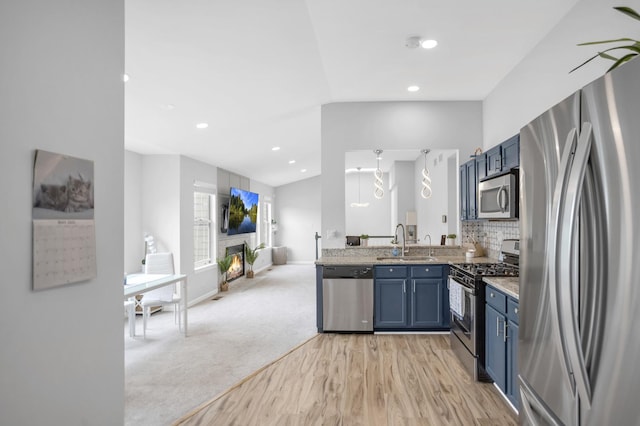 886 Ann Arbor Ln, Vernon Hills, IL 60061 - kitchen with appliances with stainless steel finishes, blue cabinetry, a sink, open floor plan, and recessed lighting