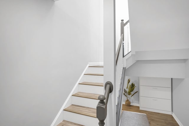 886 Ann Arbor Ln, Vernon Hills, IL 60061 - stairs with wood finished floors and baseboards