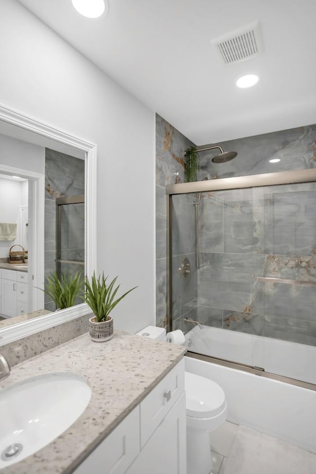 886 Ann Arbor Ln, Vernon Hills, IL 60061 - full bath with vanity, shower / bath combination with glass door, toilet, and recessed lighting