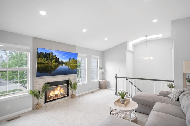 886 Ann Arbor Ln, Vernon Hills, IL 60061 - living room featuring baseboards, a chandelier, recessed lighting, a premium fireplace, and carpet floors