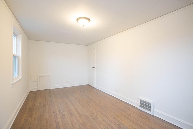 9237 S Utica Ave, Evergreen Park, IL 60805 - unfurnished room with hardwood / wood-style floors and baseboards