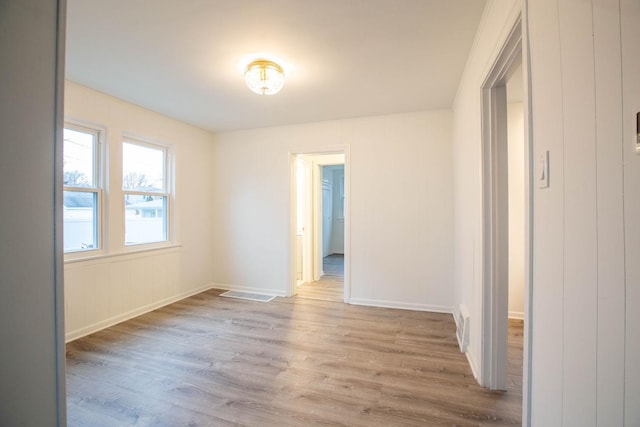 9237 S Utica Ave, Evergreen Park, IL 60805 - unfurnished bedroom with wood finished floors and baseboards