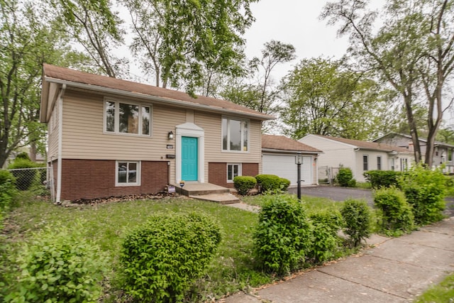 4237 Arlington Dr, Richton Park, IL 60471 - raised ranch featuring brick siding and a garage