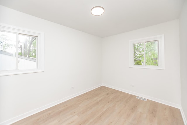 4237 Arlington Dr, Richton Park, IL 60471 - spare room featuring light wood-style floors and baseboards