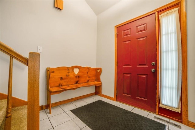 16308 S Peerless Ct, Plainfield, IL 60586 - foyer with stairs, tile patterned floors, lofted ceiling, and baseboards