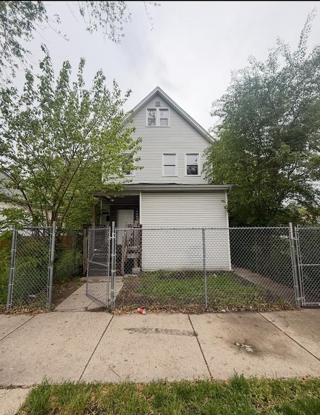 5949 S Aberdeen St, Chicago, IL 60621 - view of front facade featuring a gate