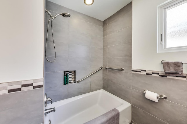 5560 W Ardmore Ave, Chicago, IL 60646 - bathroom with tile walls and bathtub / shower combination