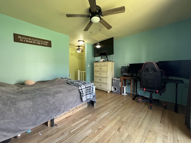 57 Vail Colony Unit 7, Fox Lake, IL 60020 - bedroom featuring wood finished floors and a ceiling fan