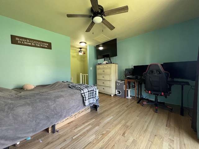 57 Vail Colony Unit 7, Fox Lake, IL 60020 - bedroom featuring wood finished floors and a ceiling fan