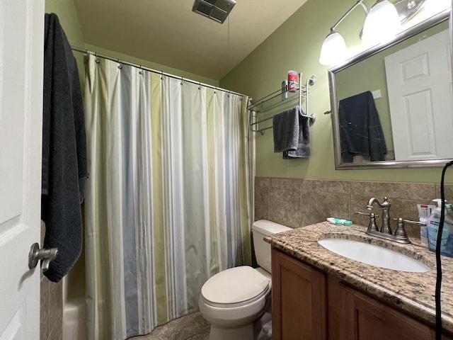 57 Vail Colony Unit 7, Fox Lake, IL 60020 - bathroom with vanity, toilet, and tile patterned flooring