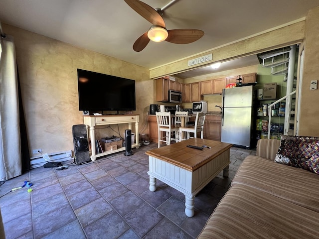 57 Vail Colony Unit 7, Fox Lake, IL 60020 - living area featuring ceiling fan and dark stone finish floors