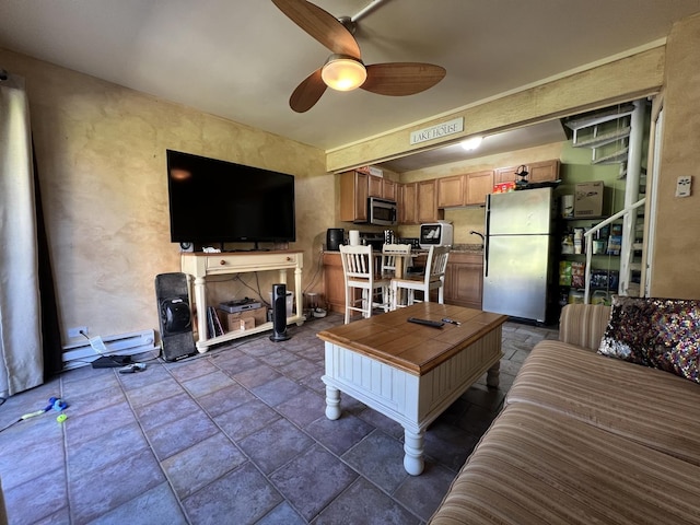 57 Vail Colony Unit 7, Fox Lake, IL 60020 - living room featuring ceiling fan and dark stone finish flooring