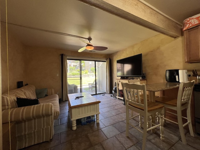 57 Vail Colony Unit 7, Fox Lake, IL 60020 - living room with a ceiling fan, stone tile flooring, and beam ceiling