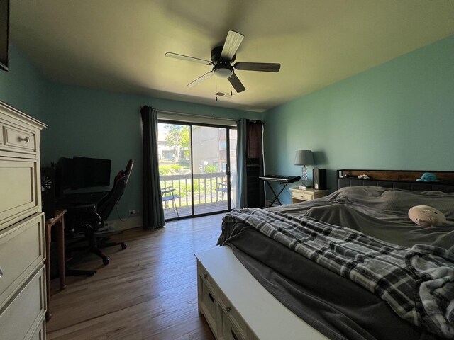 57 Vail Colony Unit 7, Fox Lake, IL 60020 - bedroom with access to outside, dark wood-style floors, an office area, and ceiling fan