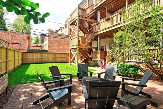 2149 N Seminary Ave Unit A, Chicago, IL 60614 - view of patio / terrace featuring a fire pit and stairway