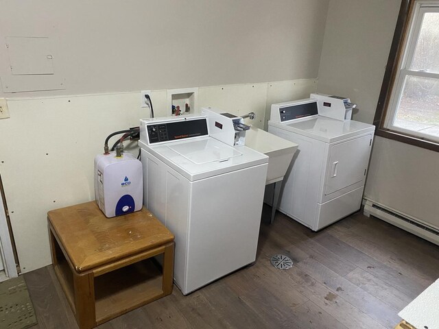265 E Prairie St, Manhattan, IL 60442 - shared laundry room with washing machine and clothes dryer, dark wood-style flooring, and a baseboard heating unit
