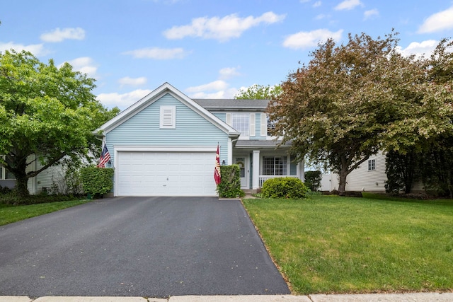 1585 Belle Haven Dr, Grayslake, IL 60030 - traditional-style home featuring driveway, a front yard, and an attached garage
