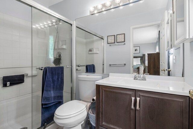 1585 Belle Haven Dr, Grayslake, IL 60030 - bathroom featuring vanity, toilet, and a shower stall