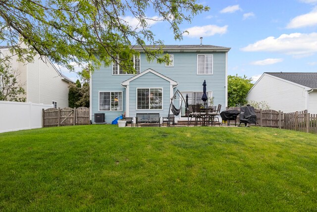 1585 Belle Haven Dr, Grayslake, IL 60030 - back of house featuring a patio, a gate, and central air condition unit