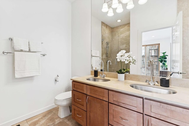 921 N Honore St Unit B, Chicago, IL 60622 - full bath with a shower stall, double vanity, toilet, tile patterned flooring, and baseboards