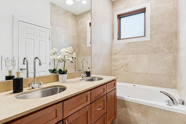 921 N Honore St Unit B, Chicago, IL 60622 - bathroom featuring double vanity, a garden tub, and tile walls