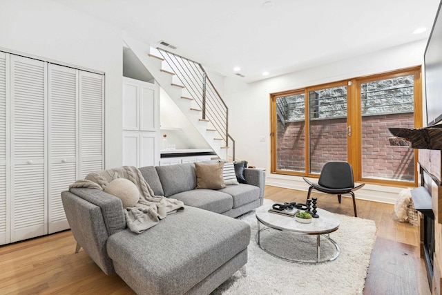 921 N Honore St Unit B, Chicago, IL 60622 - living area with stairs, light wood-style flooring, recessed lighting, and baseboards