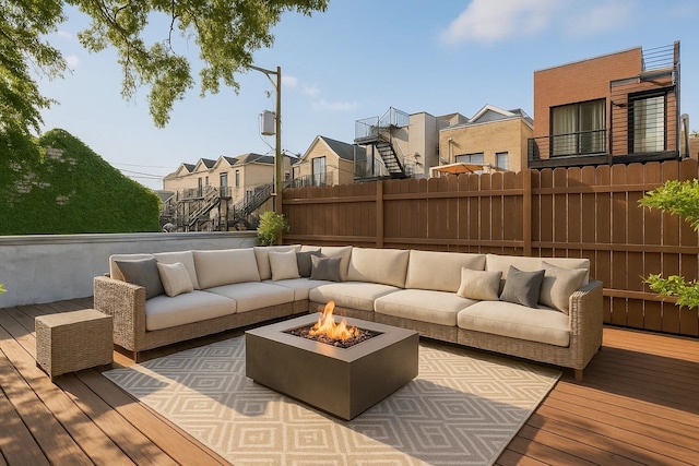 921 N Honore St Unit B, Chicago, IL 60622 - wooden terrace featuring an outdoor living space with a fire pit and a residential view