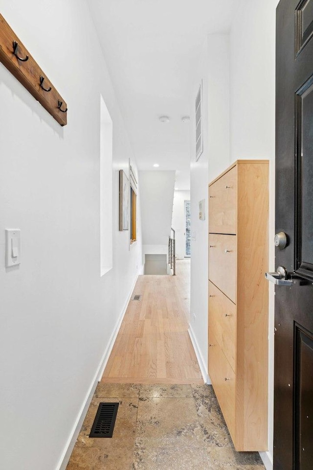 921 N Honore St Unit B, Chicago, IL 60622 - corridor with baseboards and an upstairs landing