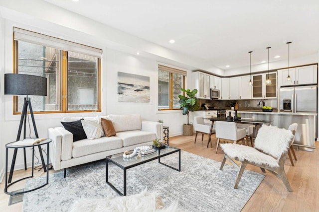 921 N Honore St Unit B, Chicago, IL 60622 - living room with baseboards, recessed lighting, and light wood finished floors