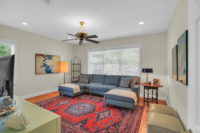 2502 Prairie Ridge Pl, Champaign, IL 61822 - living area with wood finished floors, ceiling fan, baseboards, and recessed lighting