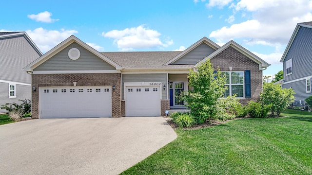 16002 S Selfridge Cir, Plainfield, IL 60586 - view of front of home featuring brick siding, a garage, and driveway