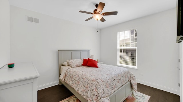 16002 S Selfridge Cir, Plainfield, IL 60586 - bedroom featuring dark wood-style flooring, baseboards, and a ceiling fan