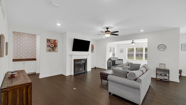 16002 S Selfridge Cir, Plainfield, IL 60586 - living room featuring ceiling fan, dark wood-style floors, a glass covered fireplace, baseboards, and recessed lighting