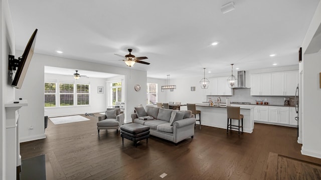 16002 S Selfridge Cir, Plainfield, IL 60586 - living room with ceiling fan, dark wood-style flooring, recessed lighting, and baseboards