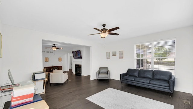 16002 S Selfridge Cir, Plainfield, IL 60586 - living room featuring ceiling fan, dark wood-style floors, and a glass covered fireplace