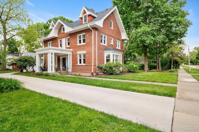 352 Elm St, Batavia, IL 60510 - view of front of property featuring brick siding and a front yard