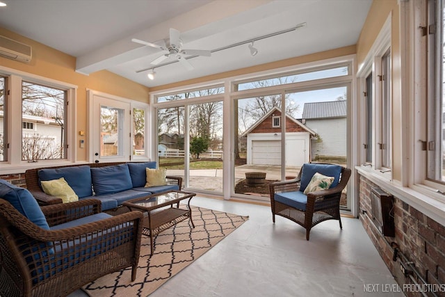 352 Elm St, Batavia, IL 60510 - sunroom with track lighting, an AC wall unit, and plenty of natural light