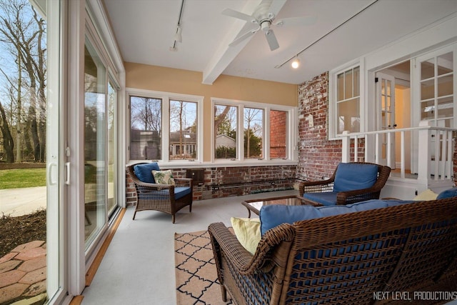 352 Elm St, Batavia, IL 60510 - sunroom / solarium with track lighting, ceiling fan, brick wall, carpet floors, and beamed ceiling