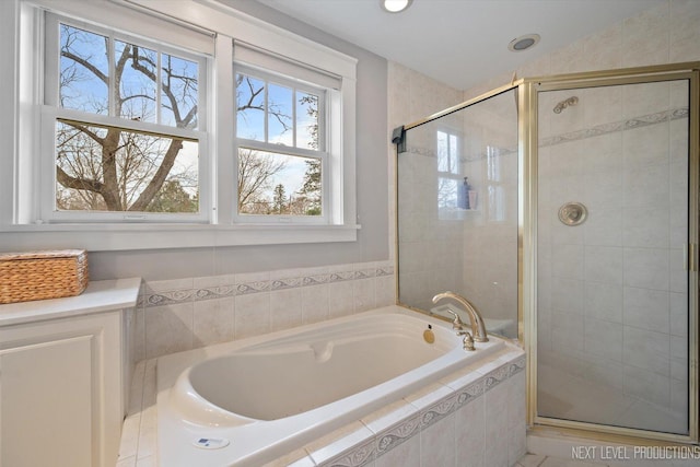 352 Elm St, Batavia, IL 60510 - bathroom with a garden tub, a shower stall, and recessed lighting
