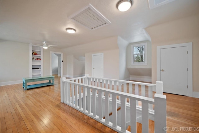 352 Elm St, Batavia, IL 60510 - hall with an upstairs landing, hardwood / wood-style flooring, attic access, and baseboards