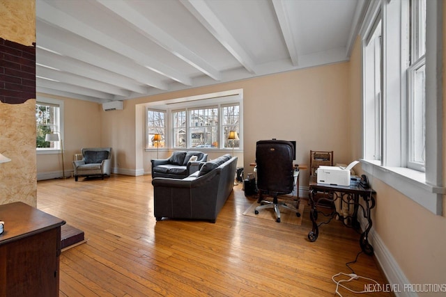 352 Elm St, Batavia, IL 60510 - office with a wall unit AC, beamed ceiling, light wood-style floors, and baseboards